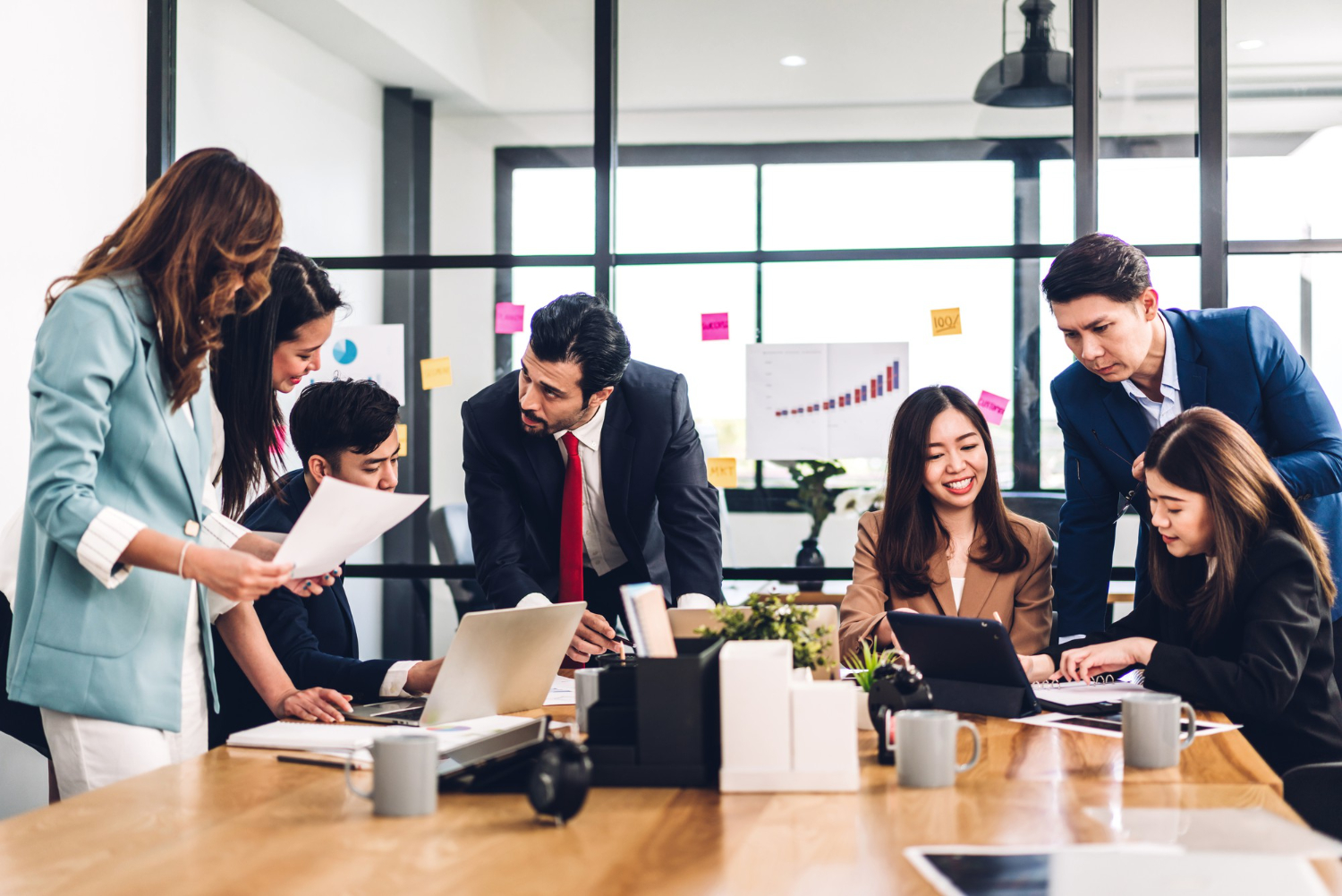 person smiling skywards in urban setting